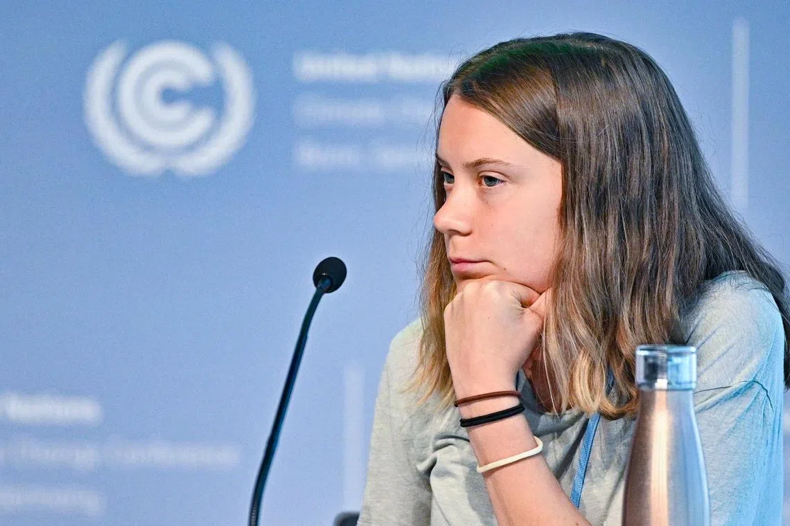 epa10688539 Swedish environmental activist Greta Thunberg addresses a press-conference at the Climate Change Conference in the former Bundestag in Bonn, Germany, 13 June 2023. The SB58 Climate Change Conference in Bonn runs through 165 June and it is the pre-sessional meeting for the COP28 Climate Change Conference, scheduled to be held in Dubai in December 2023.  EPA-EFE/BENJAMIN WESTHOFF