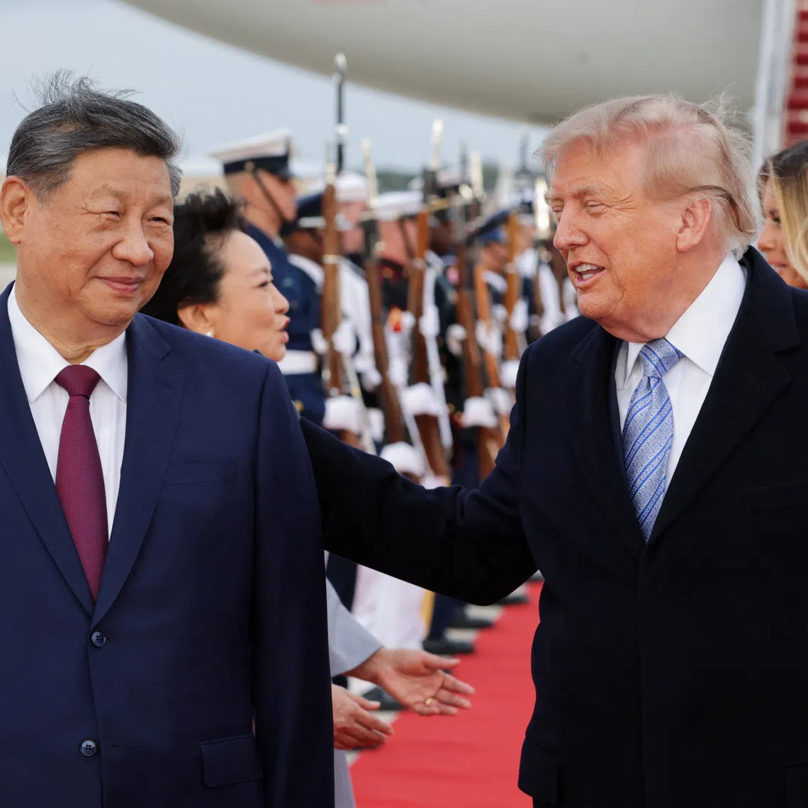 US President Donald Trump and Chinese President Xi Jinping react as Xi arrives ahead of a state visit at Joint Base Andrews, Maryland, US, September 23, 2026. REUTERS/Jonathan Ernst