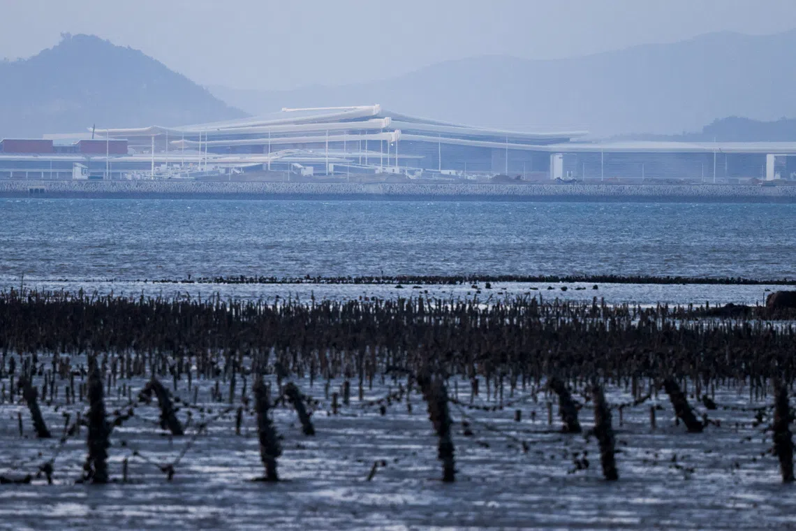 A new airport under construction in Xiamen, China as seen from Kinmen, Taiwan October 18, 2025. REUTERS/Ann Wang