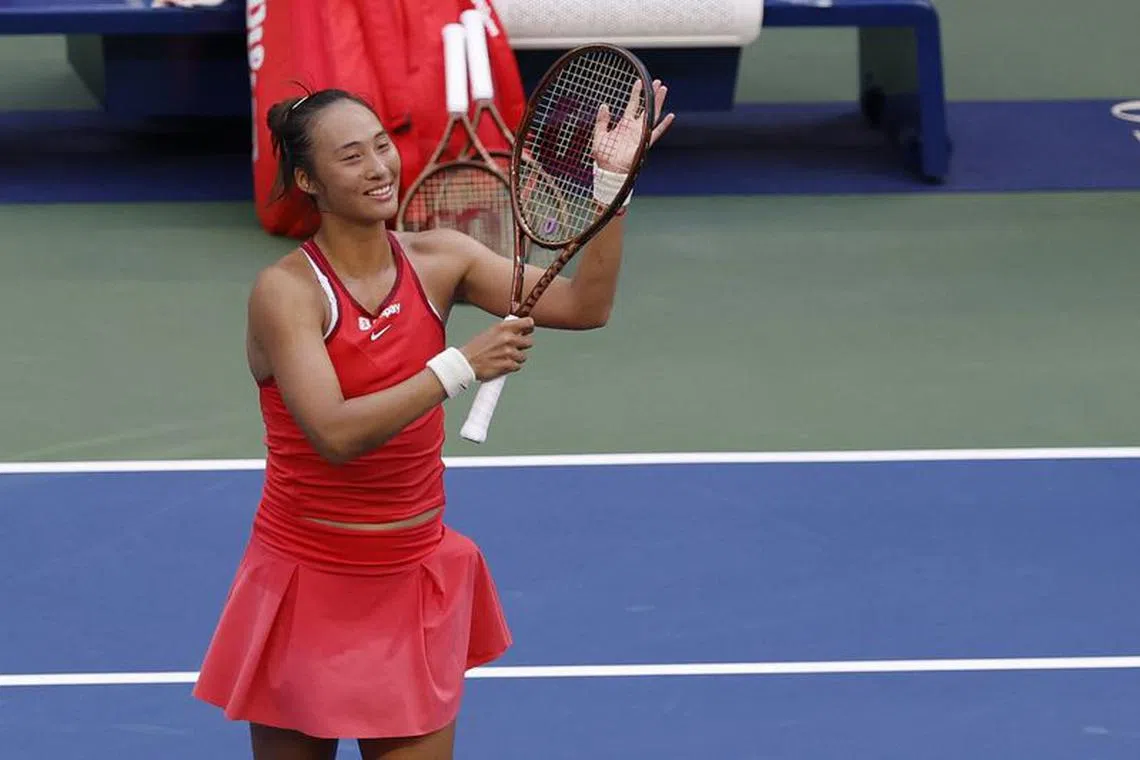 Sep 4, 2023; Flushing, NY, USA; Qinwen Zheng of China salutes the crowd after her match against Ons Jabeur of Tunisia (not pictured) on day eight of the 2023 U.S. Open tennis tournament at USTA Billie Jean King National Tennis Center. Mandatory Credit: Geoff Burke-USA TODAY Sports