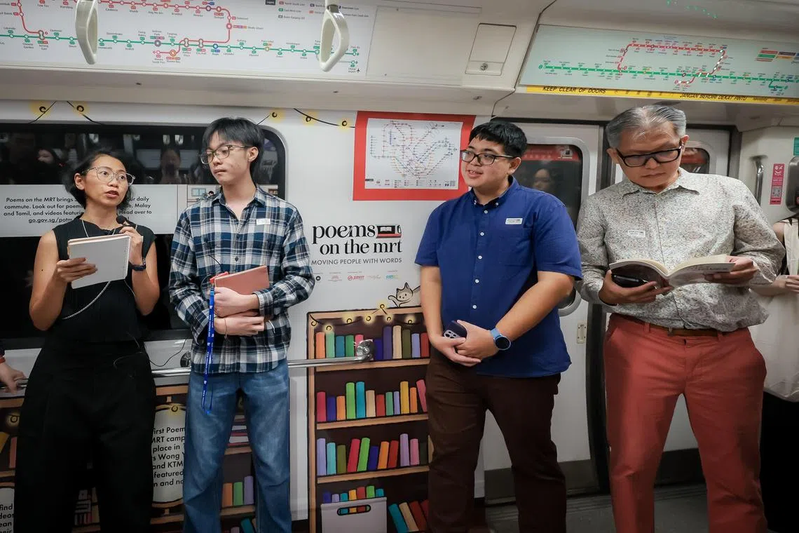 (From left) Writers Izyanti Asa'ari, Yap Hao Yang, Crispin Rodrigues and Yeow Kai Chai recite poems for the Poems On The MRT initiative on a train from Ang Mo Kio to Dhoby Ghaut MRT station on Nov 1. 