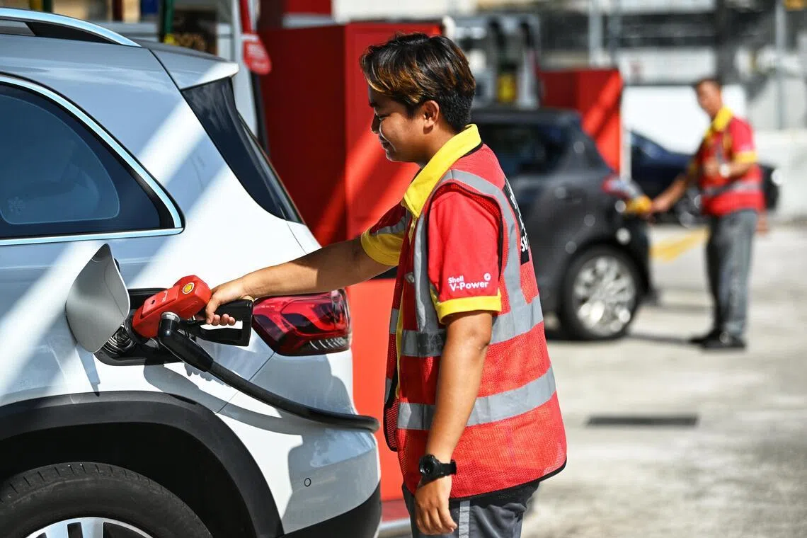 Generic photo of a pump attendant fueling a car at Shell Lakeview petrol station on August 7, 2023. Can be used for petrol price , energy, gas stories.