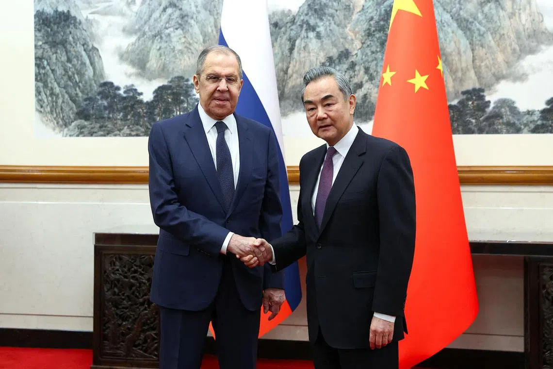 Russia's Foreign Minister Sergei Lavrov meeting China's Foreign Minister Wang Yi in Beijing on April 9.
