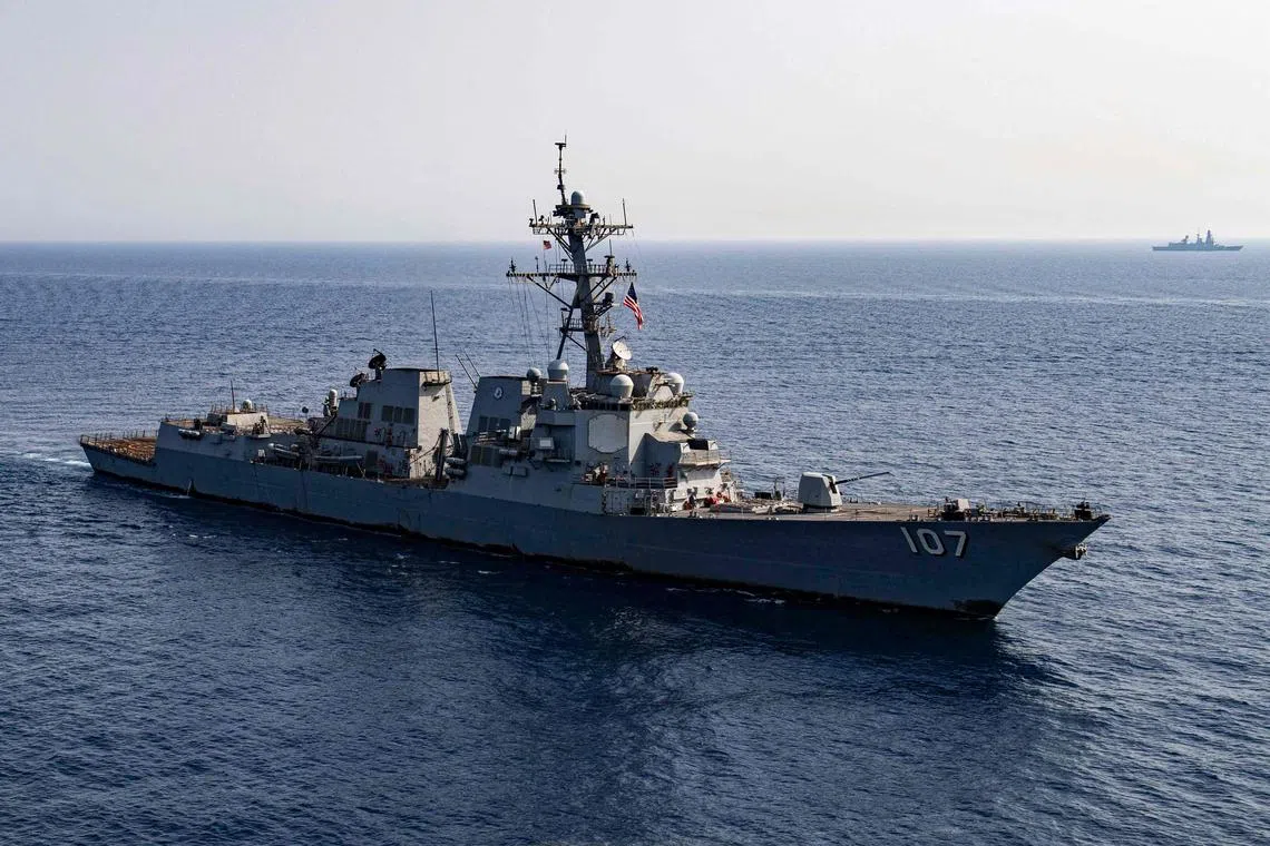 This handout photo released by the US Defence Visual Information Distribution Service (DVIDS) shows the US Navy Arleigh Burke-class guided-missile destroyer USS Gravely (DDG 107) sailing in formation with the FS Forbin (D 620) in the Red Sea on June 7, 2024, as part of their mission to support maritime stability and security in the Middle East region. (Photo by Digital / AFP) / RESTRICTED TO EDITORIAL USE - MANDATORY CREDIT "AFP PHOTO /   US Navy " - NO MARKETING NO ADVERTISING CAMPAIGNS - DISTRIBUTED AS A SERVICE TO CLIENTS