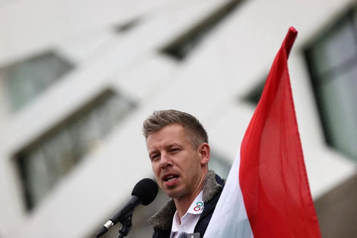 FILE PHOTO: Peter Magyar, leader of opposition TISZA party, delivers a speech during a campaign tour in Siofok, Hungary, March 27, 2025. REUTERS/Bernadett Szabo/File Photo