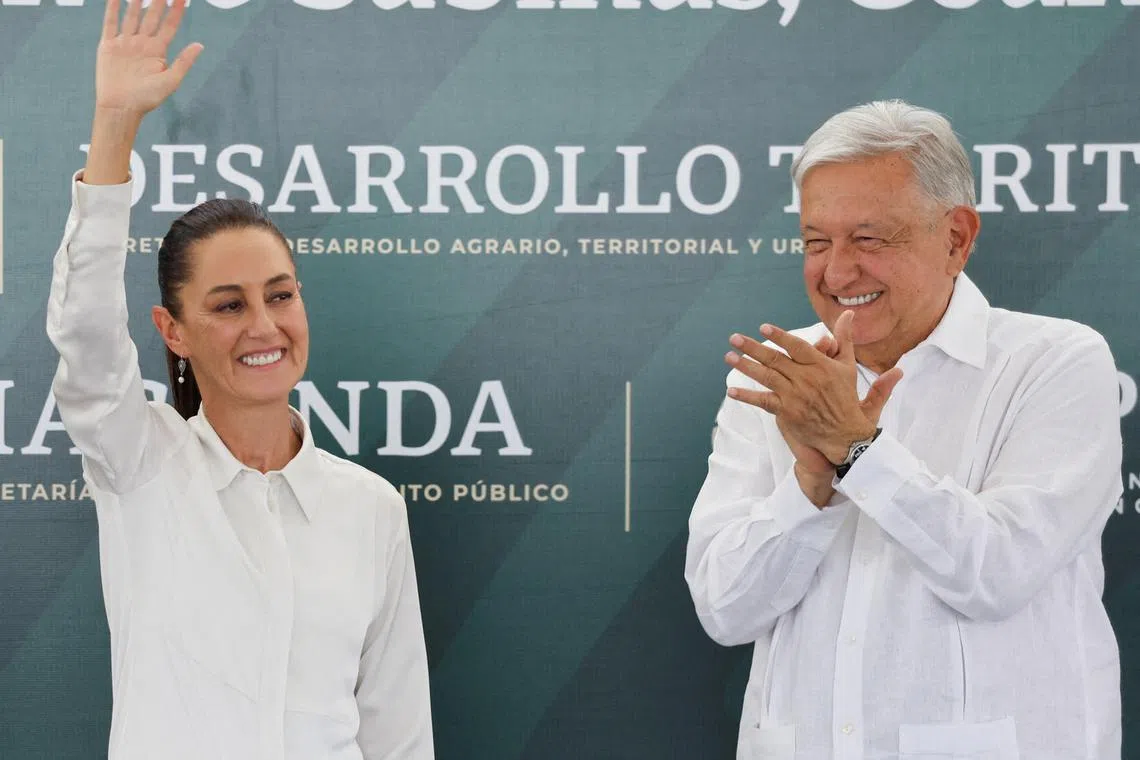 Mexican President Andres Manuel Lopez Obrador and President-elect Claudia Sheinbaum attend an event with relatives of the more than 60 miners who lost their lives in the Pasta de Conchos coal mine tragedy in February 2006, in Nueva Rosita, Mexico June 14, 2024. REUTERS/Daniel Becerril