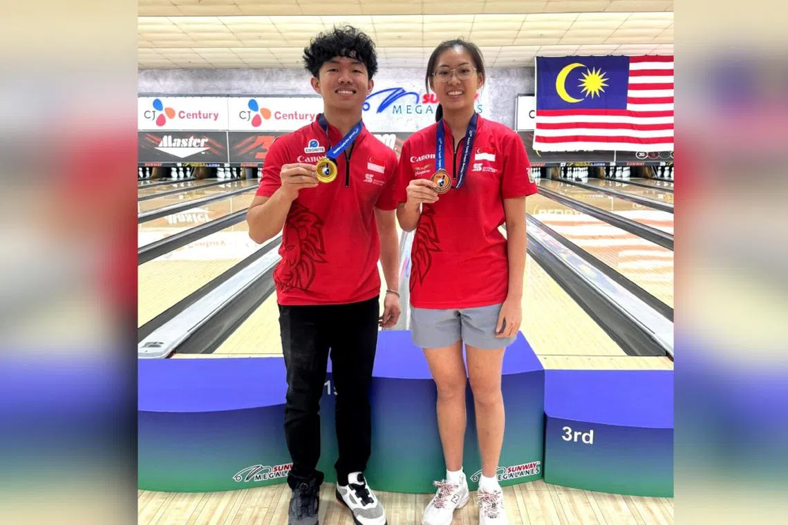 Singapore won its sixth gold medal at the Asian Youth Tenpin Bowling Championships with Mike Ong (left) clinching the boys’ masters on Aug 27 while Shirlene Wong won a bronze medal in the girls' masters. 