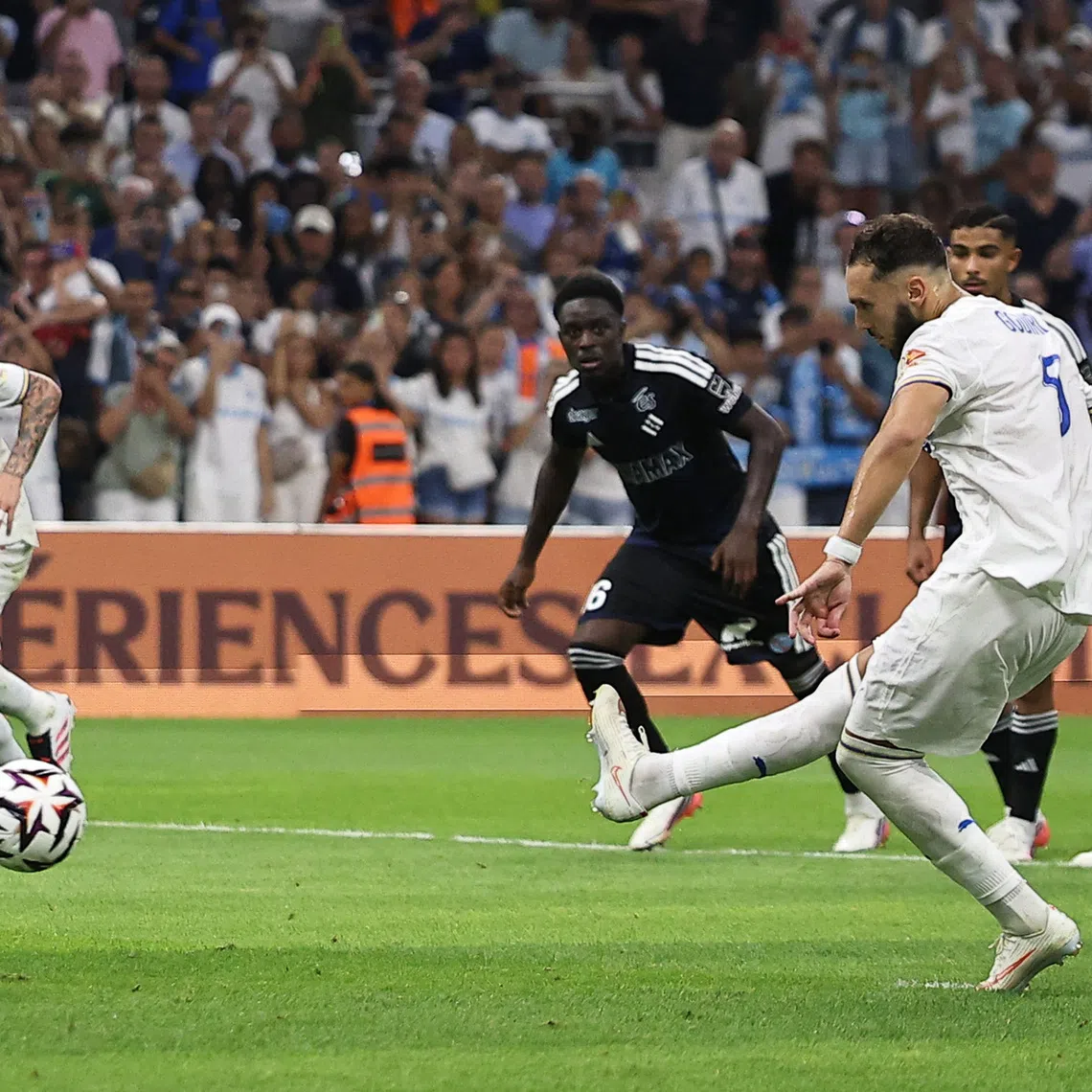 Soccer Football - Ligue 1 - Olympique de Marseille v RC Strasbourg - Orange Velodrome, Marseille, France - August 21, 2026 Olympique de Marseille's Amine Gouiri scores their second goal from the penalty spot REUTERS/Manon Cruz