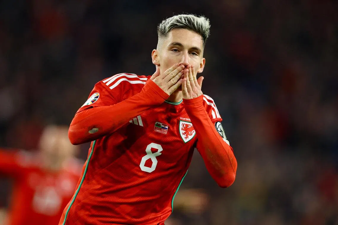 Wales' Harry Wilson celebrating after scoring the first of his two goals in the 2-1 win over Croatia in a Euro 2024 qualifier at the Cardiff City Stadium on Sunday.