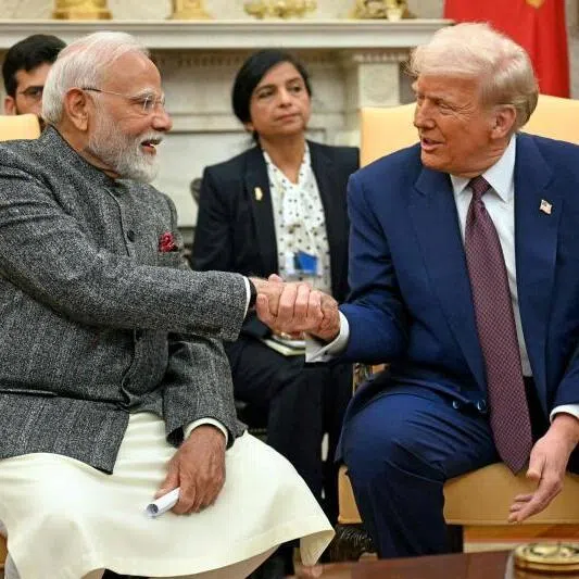 US President Donald Trump (right) shakes hands with Indian Prime Minister Narendra Modi at the White House in Washington DC, on Feb 13, 2025. 