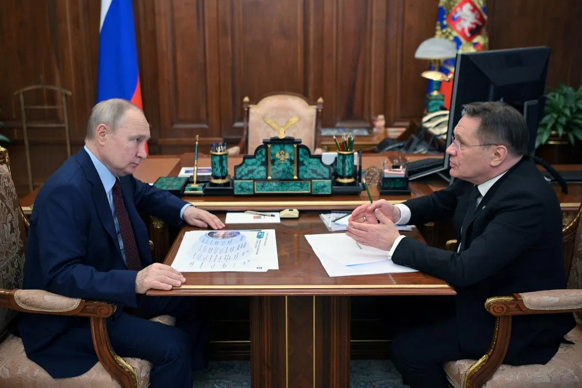 FILE PHOTO: Russian President Vladimir Putin attends a meeting with Rosatom Director General Alexey Likhachev in Moscow, Russia, August 14, 2023. Sputnik/Alexander Kazakov/Kremlin via REUTERS/File Photo