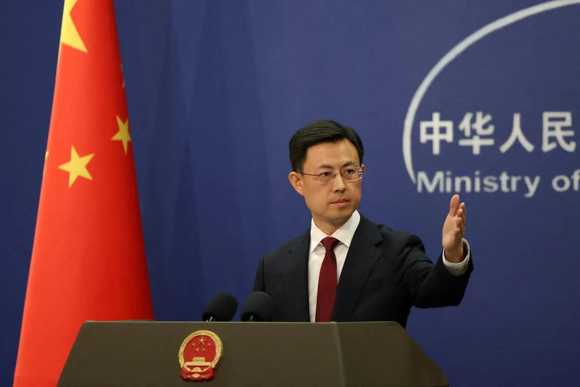FILE PHOTO: Chinese Foreign Ministry spokesperson Guo Jiakun takes a question from a journalist at a press conference in Beijing, China January 7, 2025. REUTERS/Florence Lo/File Photo