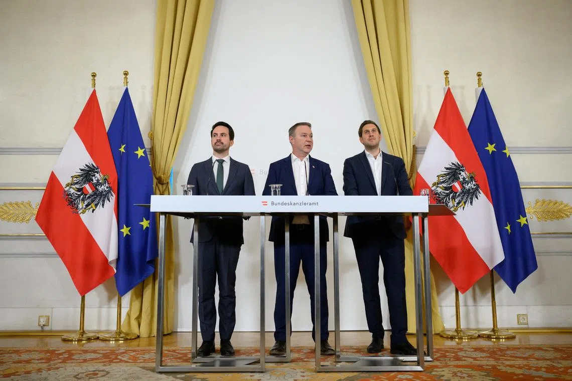 Vice Chancellor Andreas Babler of the Social Democrats, Secretary of State for Digitalization Alexander Proell of the People’s Party and Minister of Education Christoph Wiederkehr of the Neos hold a press conference on plans to ban social media for children under 14 years of age in Vienna, Austria, March 27, 2026. REUTERS/Elisabeth Mandl