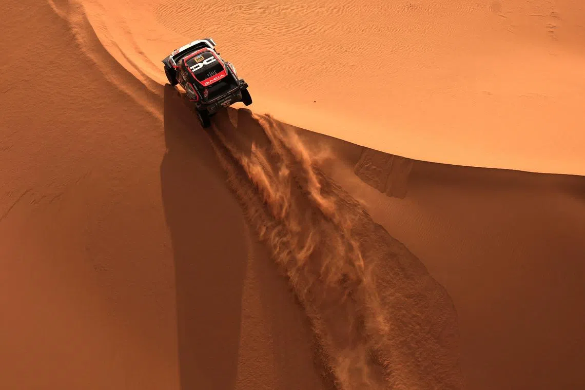 Qatari driver Nasser Al Attiyah and French co-driver Edouard Boulanger competing during Stage 7 of the Dakar Rally 2025, between Al Duwadimi and Al Duwadimi, Saudi Arabia, on Jan 11.