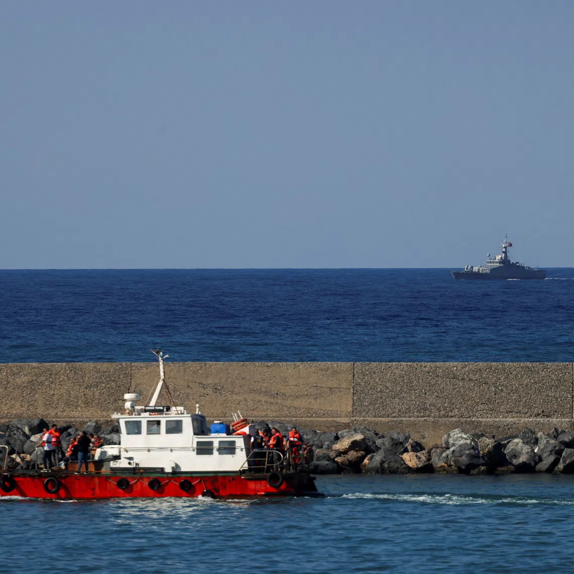 A rescue vessel evacuates people from a passenger boat that capsized off the coast of Kyrenia, in the Turkish-controlled northern Cyprus, August 30, 2026. REUTERS/Yiannis Kourtoglou