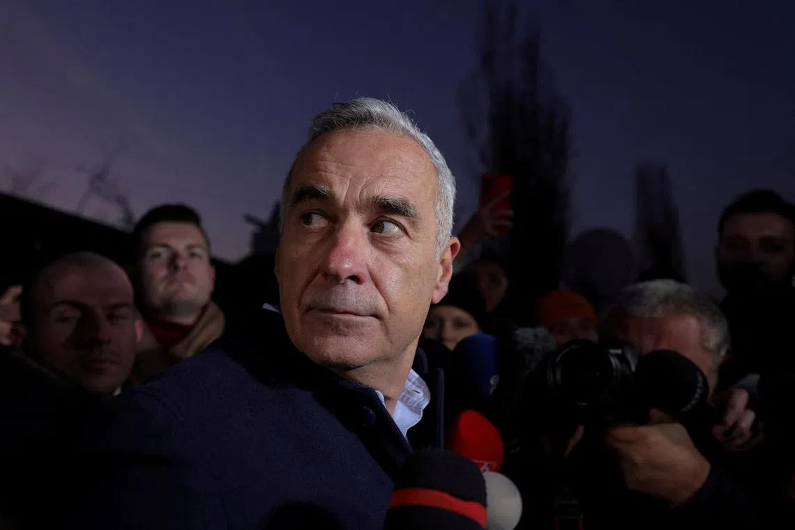 FILE PHOTO: Romanian presidential candidate Calin Georgescu makes statements to the press in Izvorani, Ilfov county, near Bucharest, Romania, November 26, 2024. Inquam Photos/Octav Ganea via REUTERS/File Photo
