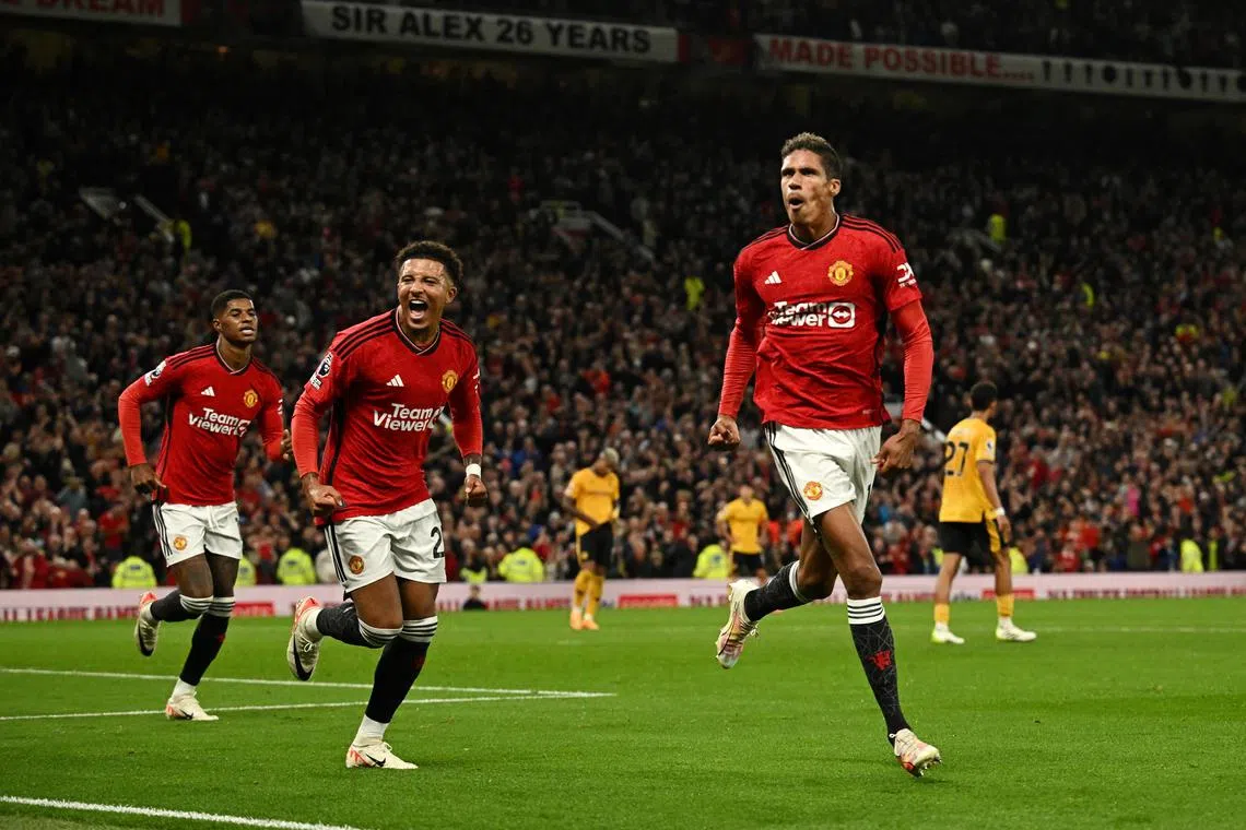  Manchester United's Raphael Varane celebrating after scoring their first and only goal against Wolves. 
