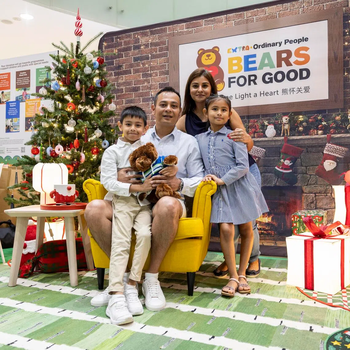 Mr Aarvin Giovanni, Ms Gurpreet Kaur and their children Ashleen and Aaryan at the Bears for Good charity roadshow.