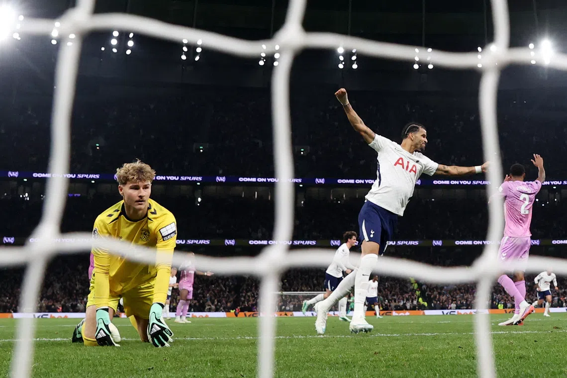 Tottenham Hotspur’s Dominic Solanke celebrates after Omar Marmoush scores their second goal.