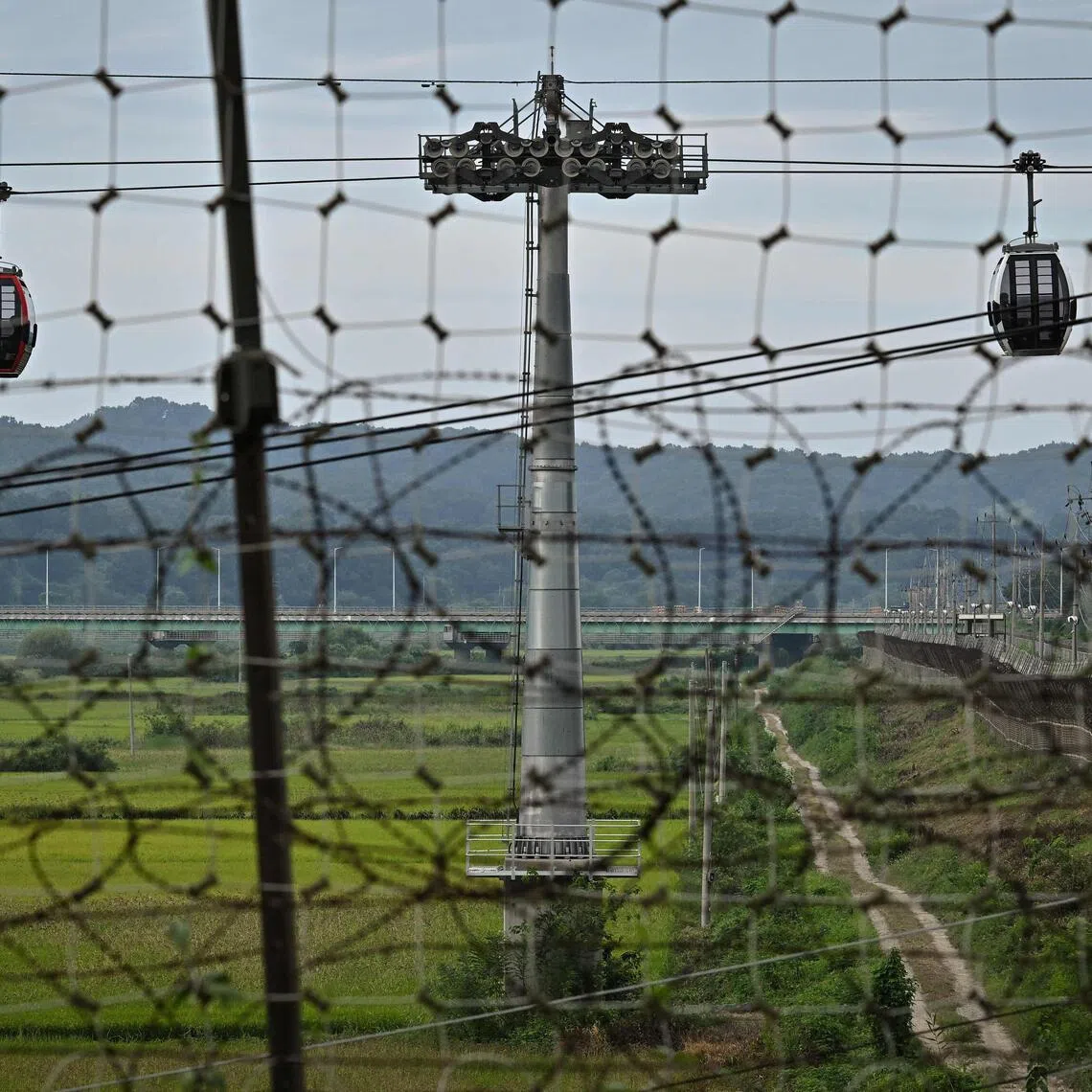 The demilitarised zone separating the two Koreas is one of the world’s most heavily fortified and mined frontiers.