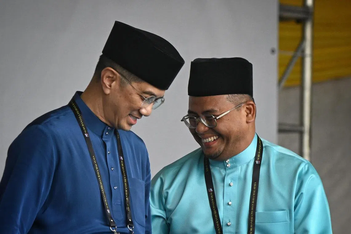 Caretaker International Trade Minister Azmin Ali (left) with Selangor chief minister Amirudin Shari at the nomination centre, on Nov 5, 2022.