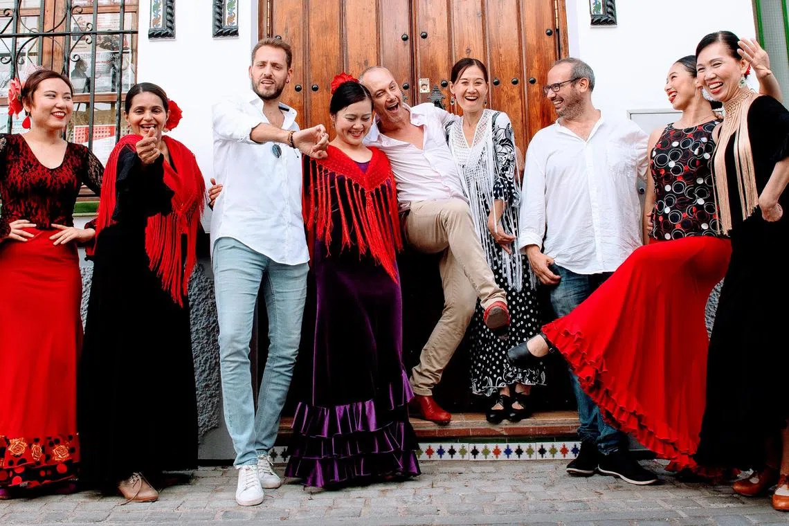 Ms Tania Goh (fourth from left) organises dance and cultural immersion tours in Spain.