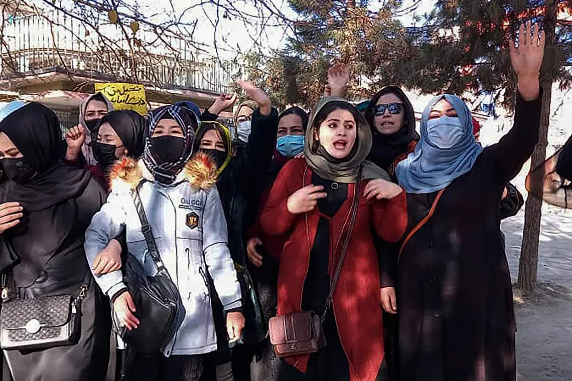 Afghan women protest against the ban on university education for women, in Kabul, on Dec 22, 2022.