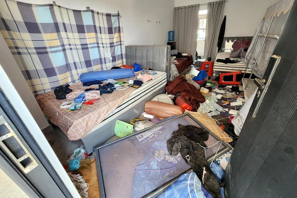 A room belonging to one of the scammers at the compound.