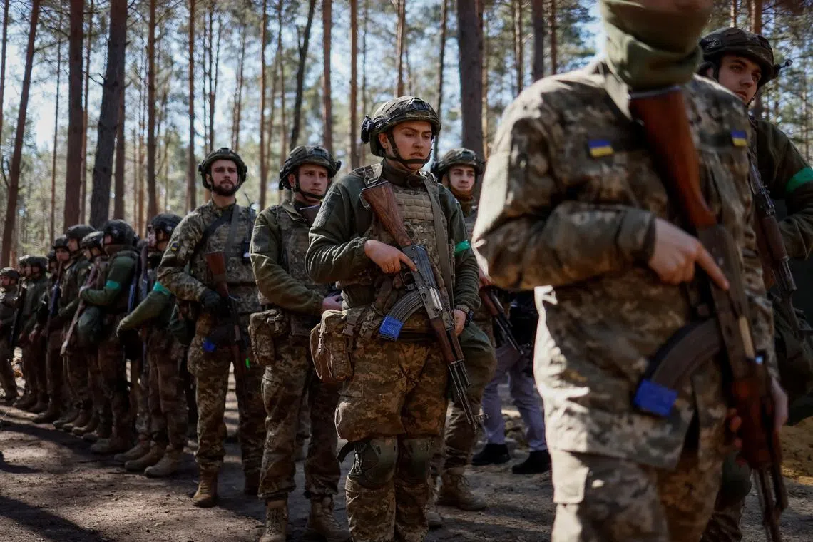 Young recruits of the 28th Knights of the Winter Campaign Separate Mechanised Brigade of the Ukrainian Armed Forces attend an exercise on April 4.