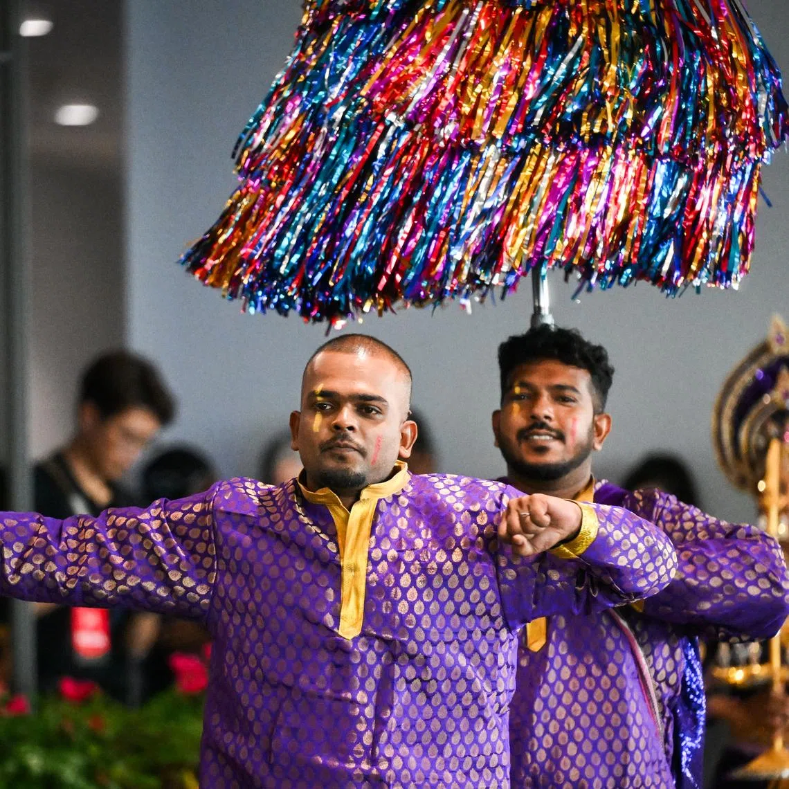 Migrant workers Manorenjinand and Subin Lal performing during the Chingay 2026 Media Preview and National Education Parade at the F1 Pit Building on Feb 7.