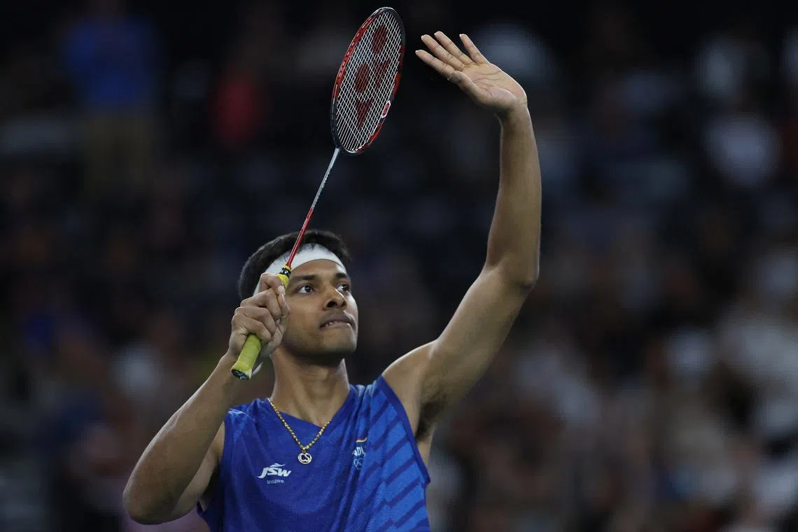 Paris 2024 Olympics - Badminton - Men's Doubles Group play stage - Porte de La Chapelle Arena, Paris, France - July 27, 2024. Chirag Shetty of India celebrates winning the Group C match with Satwiksairaj Rankireddy of India against Lucas Corvee of France and Ronan Labar of France. REUTERS/Hamad I Mohammed