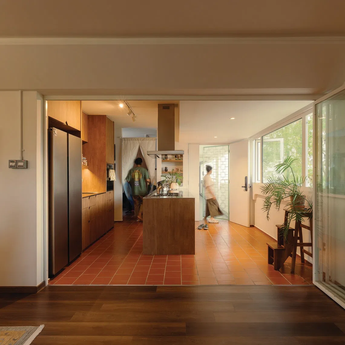 This sunny, low-rise HDB flat in Geylang East is framed by greenery.