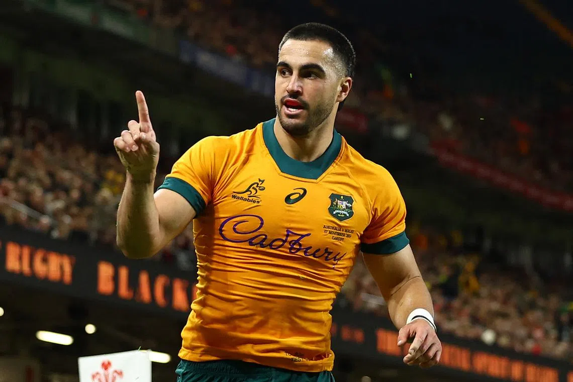 FILE PHOTO: Rugby Union - Autumn Internationals - Wales v Australia - Millennium Stadium, Cardiff, Wales, Britain - November 17, 2024 Australia's Tom Wright celebrates scoring a try REUTERS/Molly Darlington/File Photo