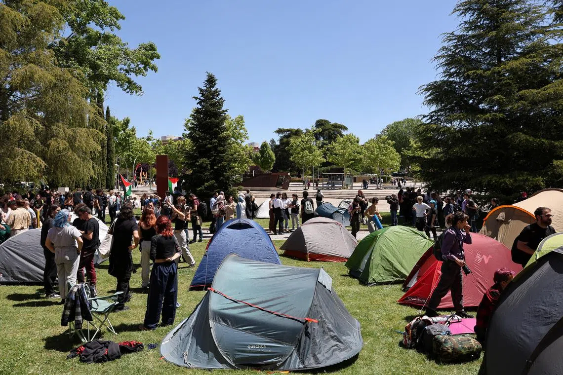 Students of the Complutense University of Madrid gather at a pro-Palestinian encampment amid the ongoing conflict between Israel and the Palestinian Islamist group Hamas, in Madrid, Spain, May 7, 2024. REUTERS/Violeta Santos Moura