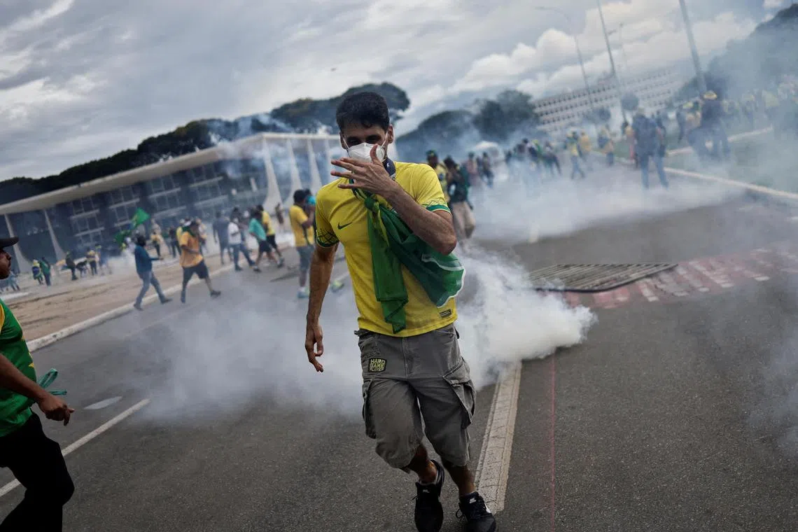 Supporters of Brazil's former president Jair Bolsonaro demonstrate against President Luiz Inacio Lula da Silva, outside the Planalto Palace in Brasilia, on Jan 8, 2023.