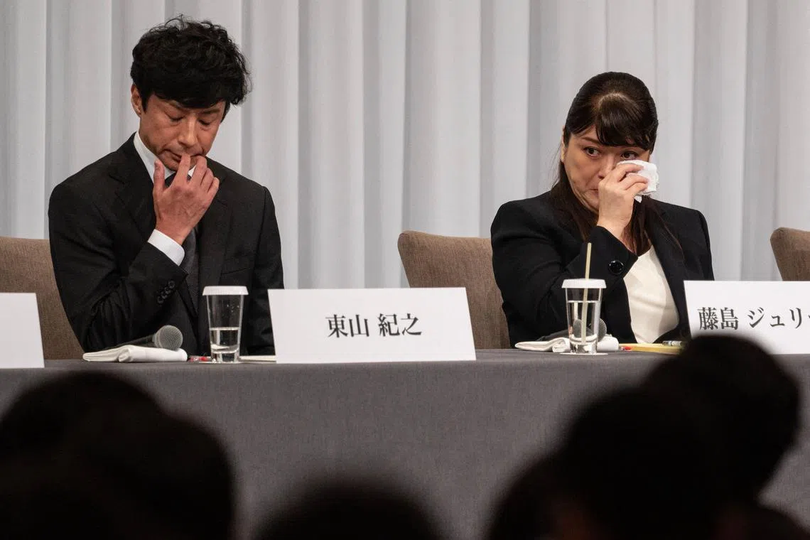 New president of Johnny and Associates Noriyuki Higashiyama (left) and outgoing president Julie Keiko Fujishima react as they speak to the media.