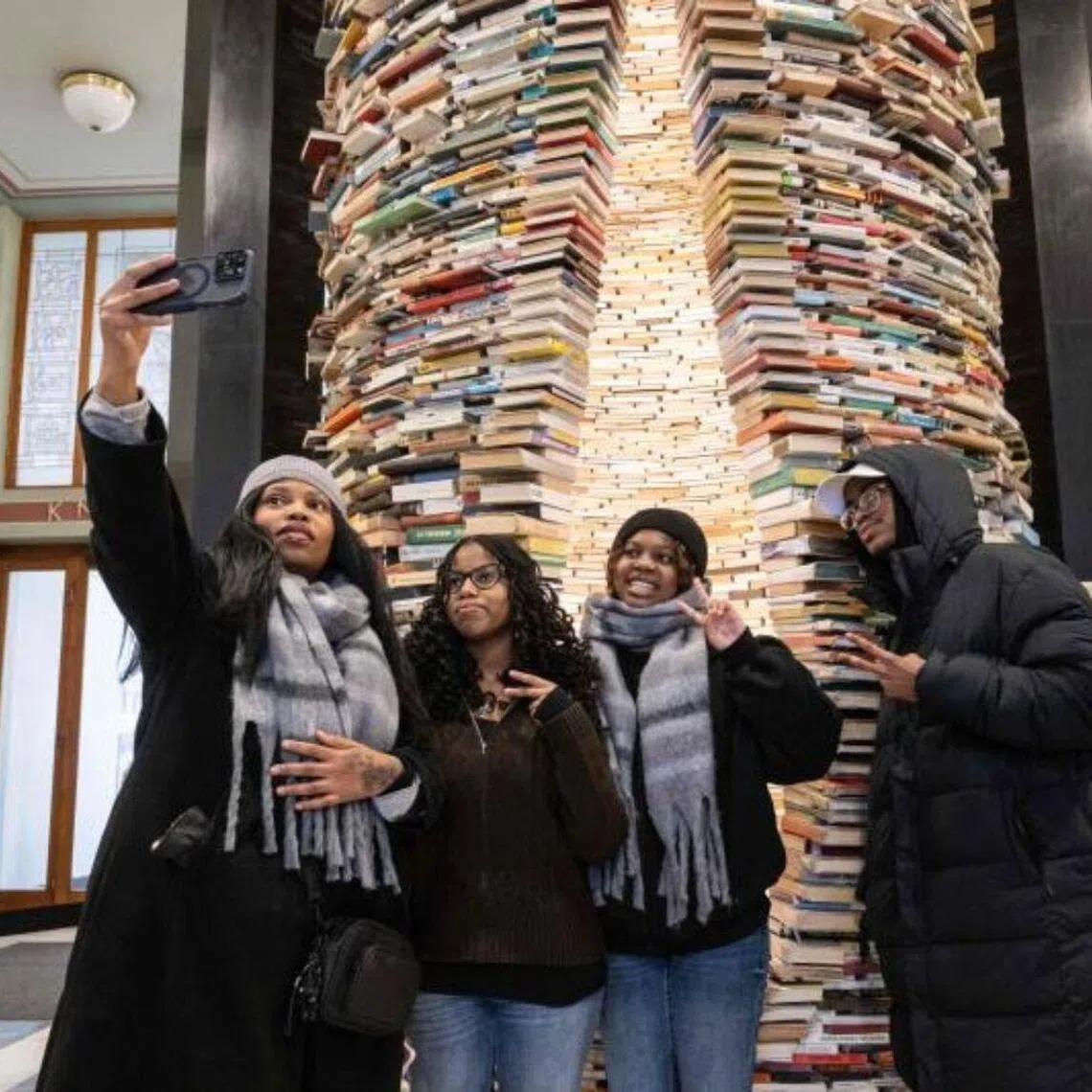 The Idiom, a statue by Slovak artist Matej Kren, is a cylindrical tower of 8,000 books.