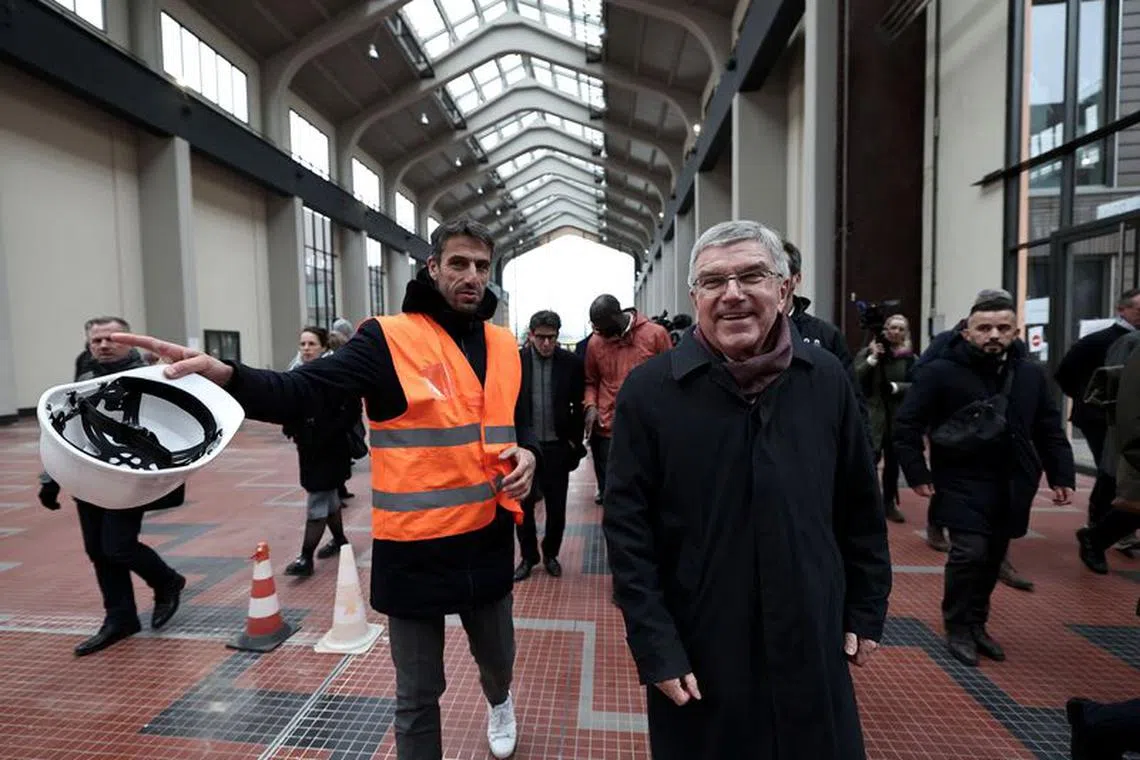 Olympics - IOC Olympic Village visit - Olympic Village, Saint-Denis, France - December 1, 2023 IOC President Thomas Bach and President of the Paris 2024 Organising Committee for the Olympic and Paralympic Games Tony Estanguet visit the Paris 2024 Olympic Village with members of the Executive Board of the International Olympic Committee Franck Fife/Pool via REUTERS