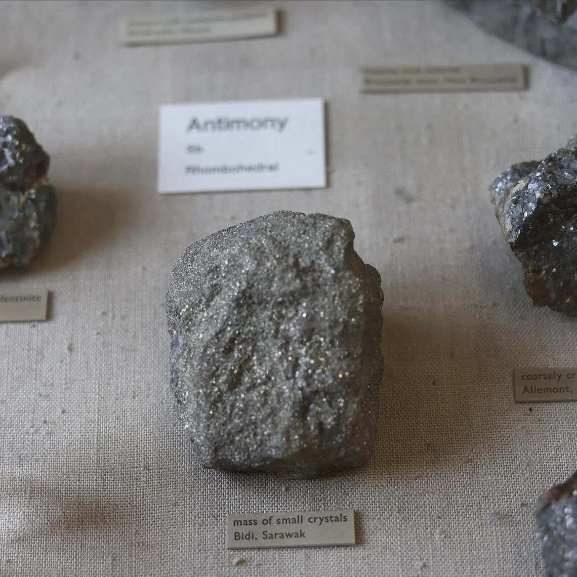 A collection of antimony – key to making bullets – is displayed at the Natural History Museum in London.
