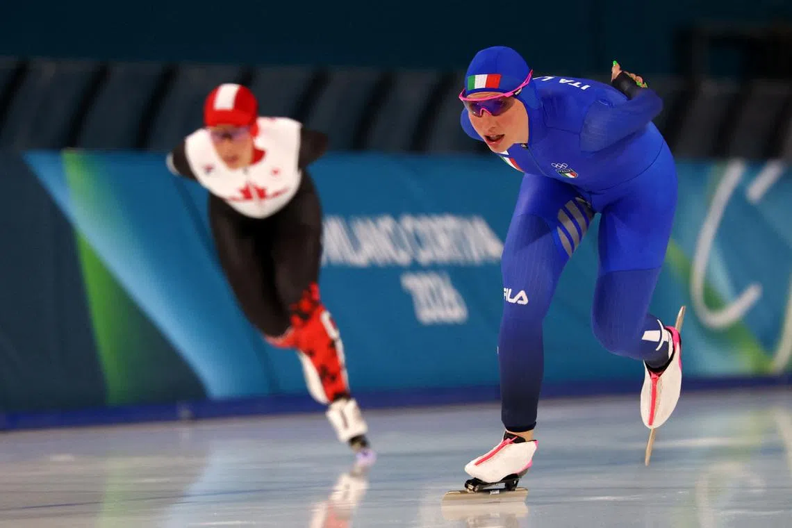 Milano Cortina 2026 Olympics - Speed Skating - Women's 3000m - Milano Speed Skating Stadium, Milan, Italy - February 07, 2026. Francesca Lollobrigida of Italy in action with Valerie Maltais of Canada during women's 3000m. REUTERS/Piroschka Van De Wouw
