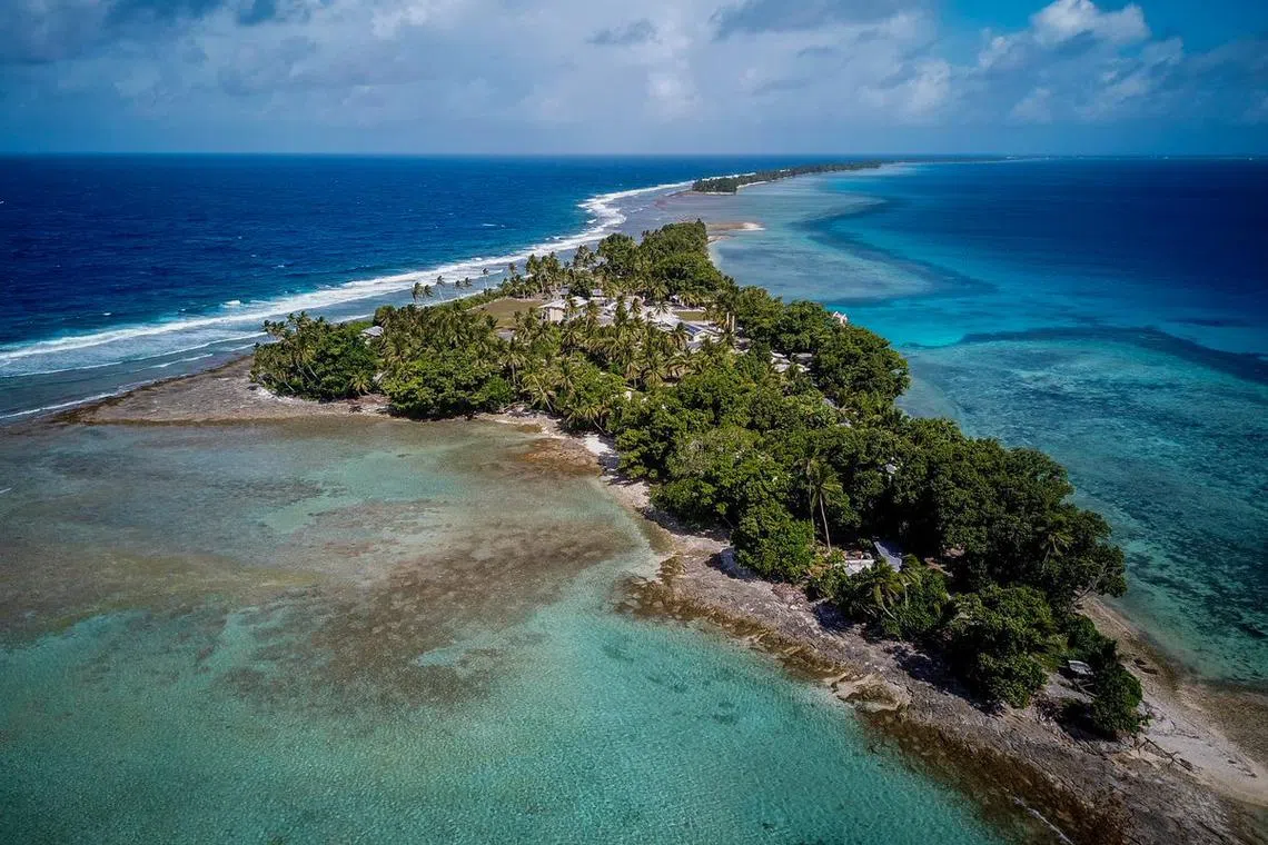 Tuvalu, a chain of nine atolls midway between Australia and Hawaii, has a highest point of only about 4.5m and is among the countries most at risk from rising sea levels.