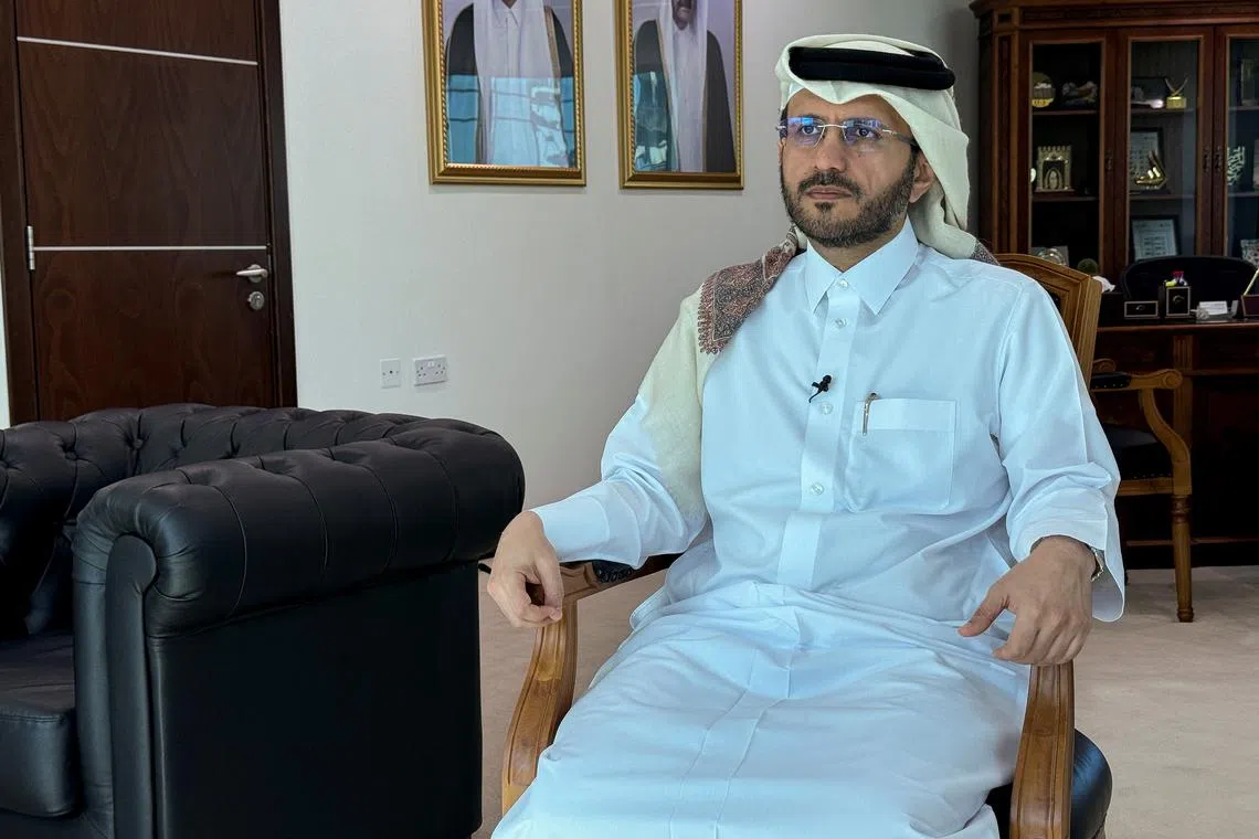 Qatar's Ministry of Foreign Affairs spokesperson, Majed Al Ansari, speaking to Reuters after Qatar helped mediate a ceasefire agreement in Gaza, in Doha, Qatar, January 20, 2025. REUTERS/Imad Creidi