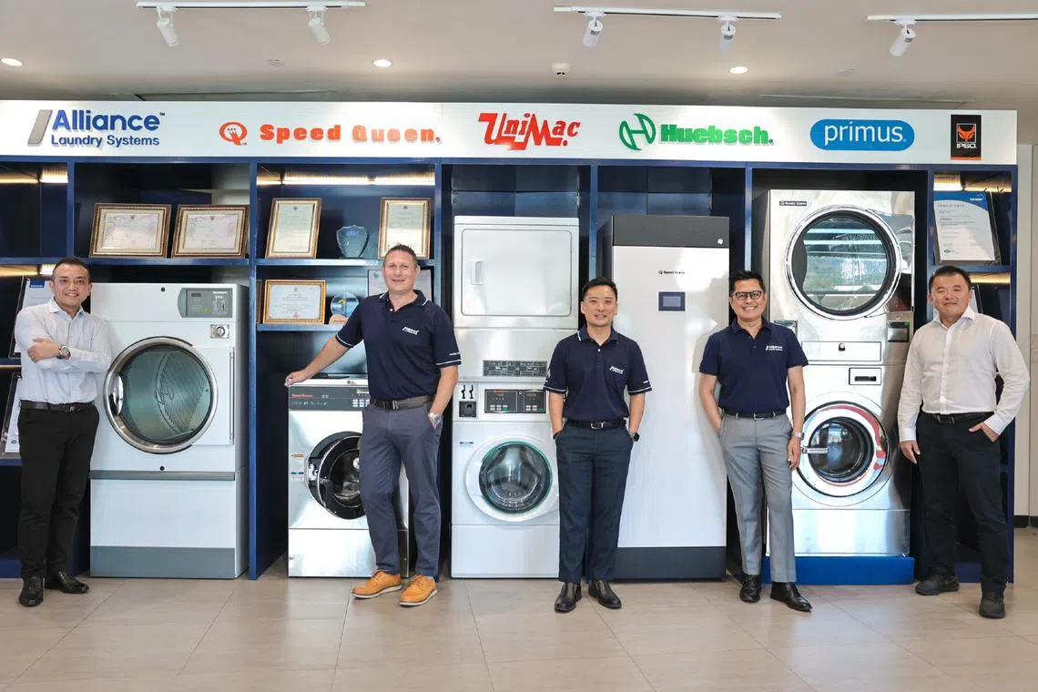 (From left) General manager of Fresh Laundry Gary Tan, managing director (APAC) of Alliance Laundry Systems Benjamin Leo Dobbs, senior director of sales (APAC) of Alliance Laundry Systems Eddie Tay, sales director (SEA) of Alliance Laundry Systems Sukree Kirai and director of Fresh Laundry Jordan Boo.