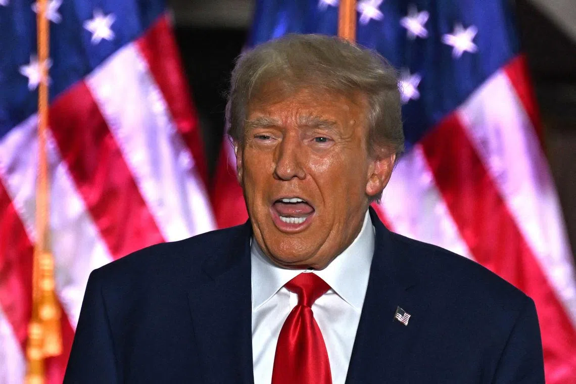 (FILES) Former US President Donald Trump delivers remarks at Trump National Golf Club Bedminster in Bedminster, New Jersey, on June 13, 2023. Former US president Donald Trump faced fresh charges July 27, 2023 alleging that he attempted to obstruct the investigation into the mishandling of top secret documents by conspiring to delete surveillance footage at his Mar-a-Lago property in Florida. (Photo by Ed JONES / AFP)