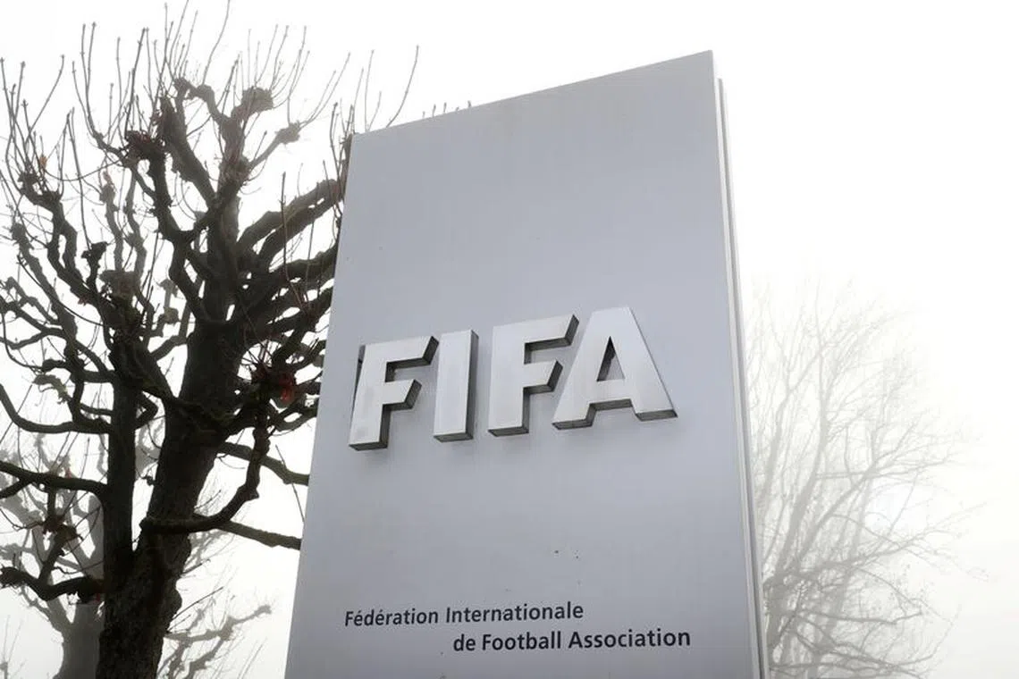 FIFA's logo is seen in front of its headquarters during a foggy autumn day in Zurich, Switzerland November 18, 2020. REUTERS/Arnd Wiegmann/ File photo