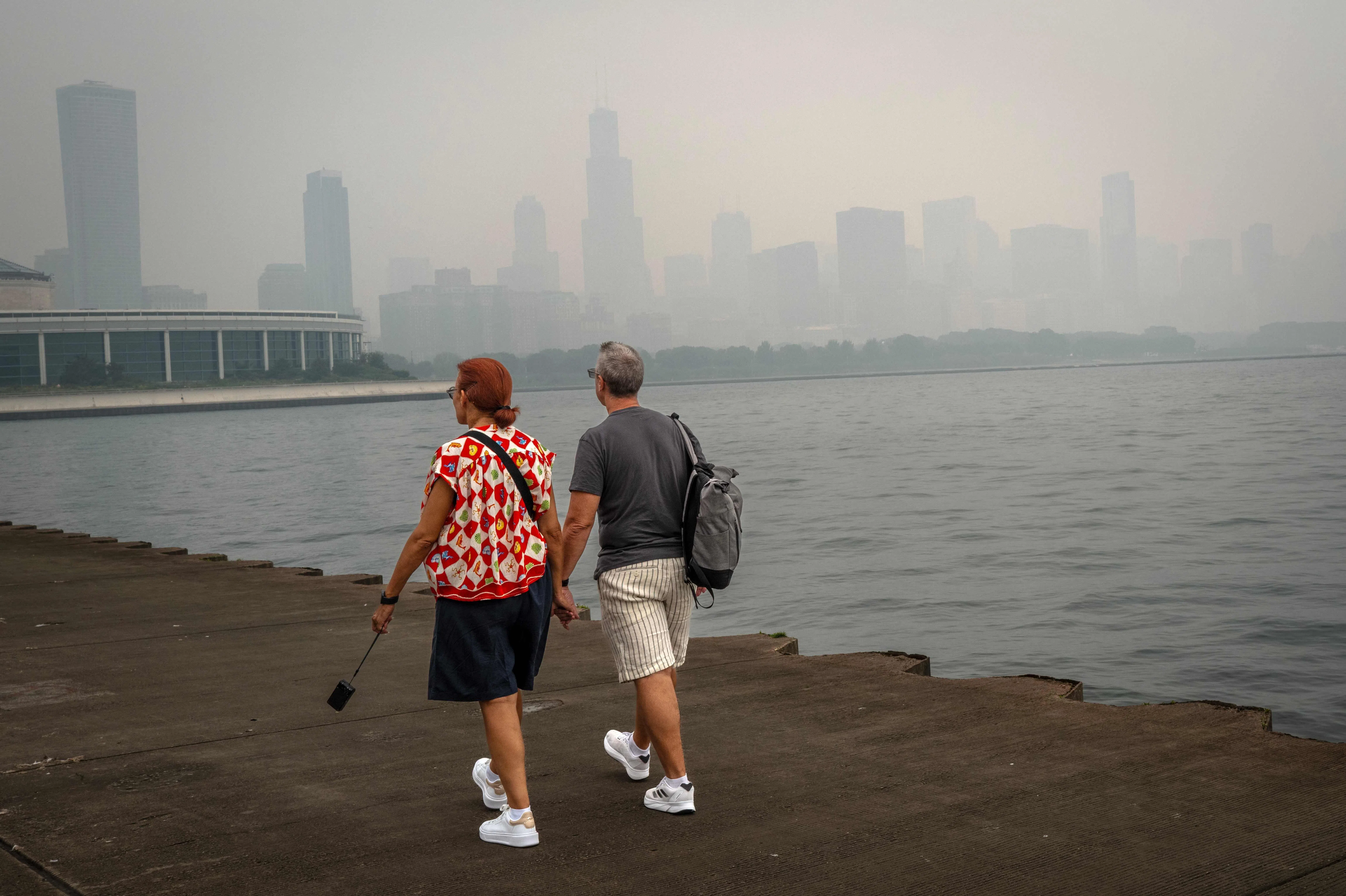 CHICAGO, ILLINOIS - JULY 17: Smoke from Canadian wildfires blankets the city on July 17, 2026 in Chicago, Illinois. City officials have encouraged people to remain inside as the smoke, combined with heat, has created a second day of hazardous conditions.   Scott Olson/Getty Images/AFP (Photo by SCOTT OLSON / GETTY IMAGES NORTH AMERICA / Getty Images via AFP)
