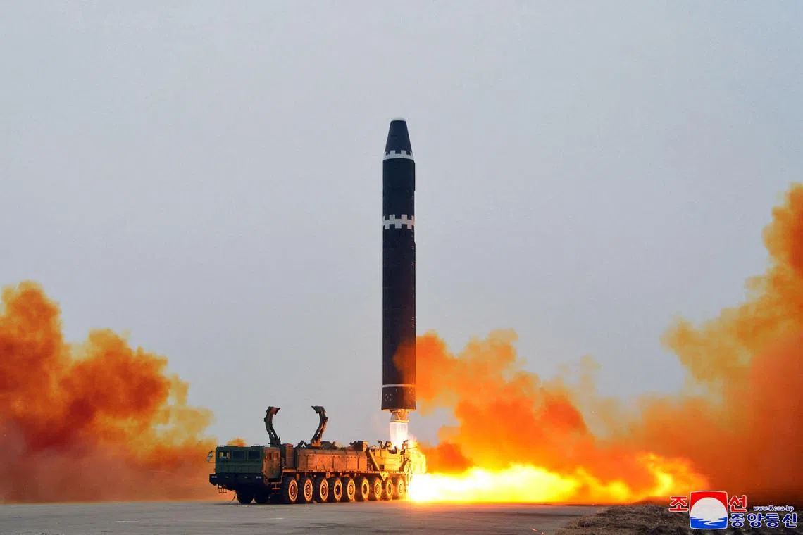 This picture taken on February 18, 2023 and released from North Korea's official Korean Central News Agency (KCNA) on February 19, 2023 shows test-firing of the intercontinental ballistic missile (ICBM) "Hwasong-15", at Pyongyang International Airport. (Photo by STRINGER / KCNA VIA KNS / AFP) / South Korea OUT / ---EDITORS NOTE--- RESTRICTED TO EDITORIAL USE - MANDATORY CREDIT "AFP PHOTO/KCNA VIA KNS" - NO MARKETING NO ADVERTISING CAMPAIGNS - DISTRIBUTED AS A SERVICE TO CLIENTS / THIS PICTURE WAS MADE AVAILABLE BY A THIRD PARTY. AFP CAN NOT INDEPENDENTLY VERIFY THE AUTHENTICITY, LOCATION, DATE AND CONTENT OF THIS IMAGE --- / 