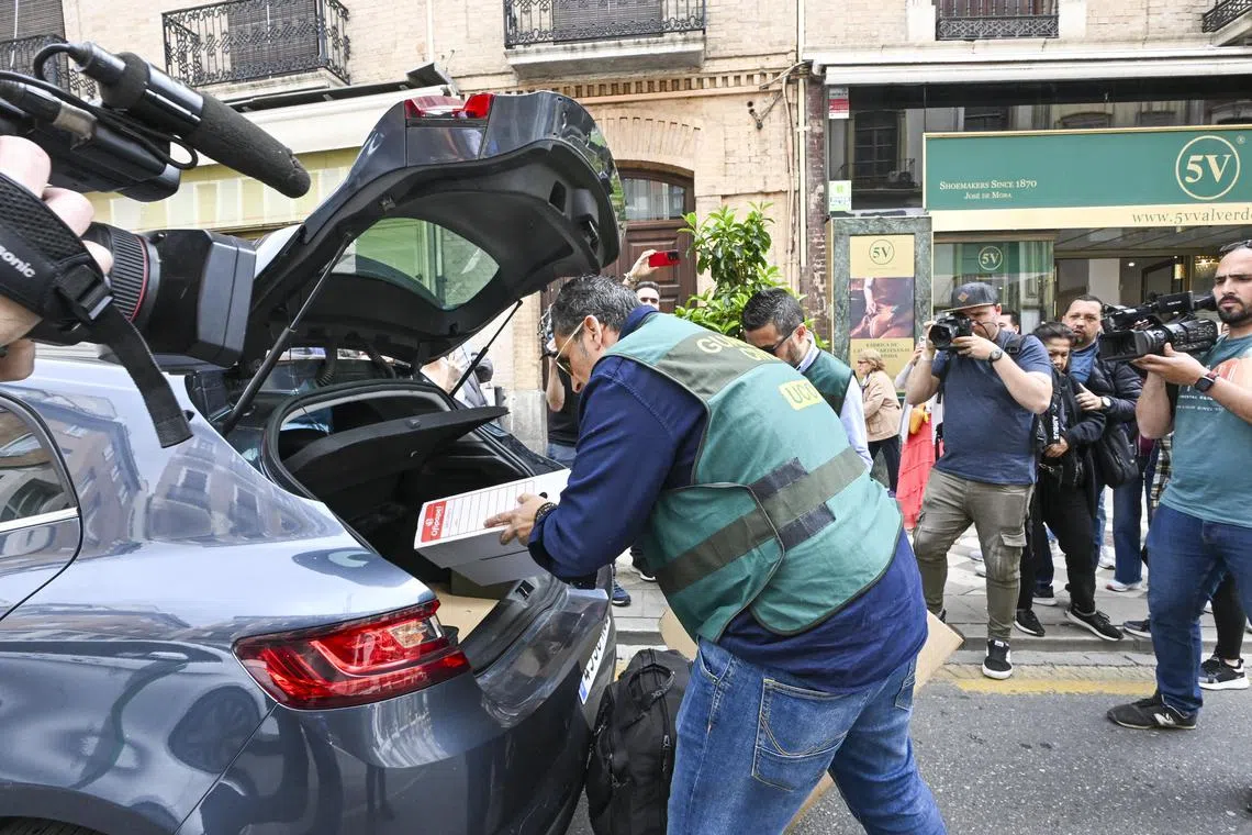 Officers of Spain's Central Operational Unit (UCO), central body of the Judicial Police service of the Civil Guard, leave the home of the former president of the Spanish Football Federation (RFEF) Luis Rubiales in Granada.