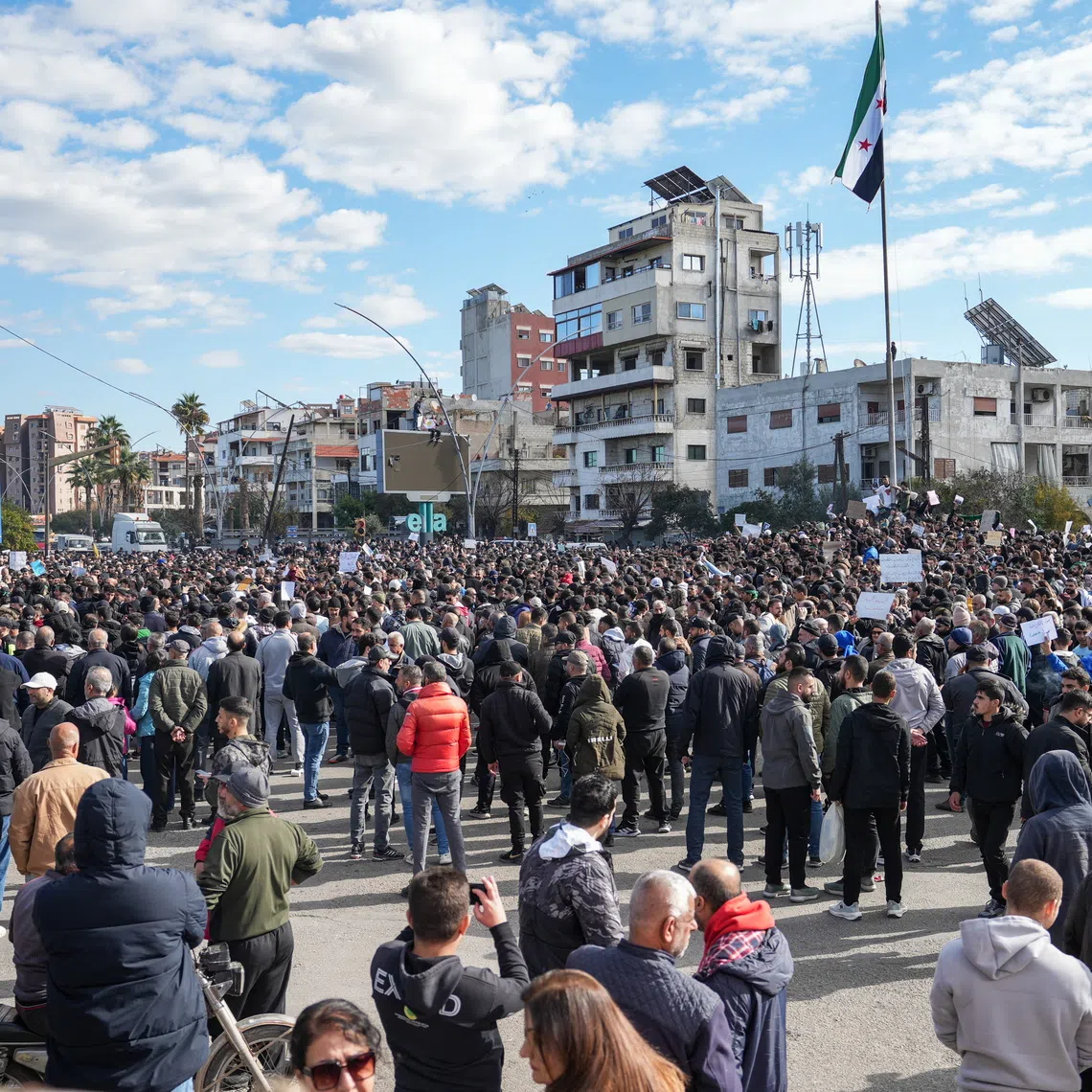 Thousands of Syrian Alawites gathered in coastal and central parts of the country on Dec 28 to protest after Dec 26’s bombing at a mosque.