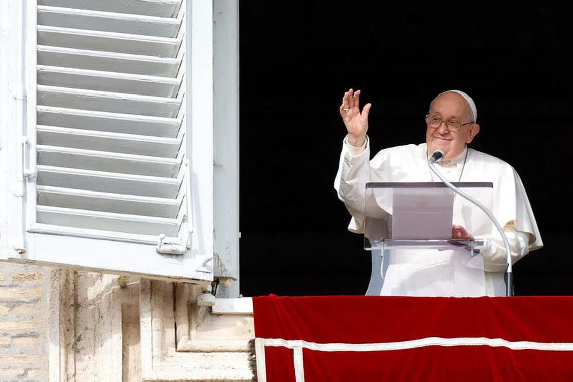 Pope Francis leads the Angelus prayer at the Vatican, January 1, 2024. REUTERS/Remo Casilli